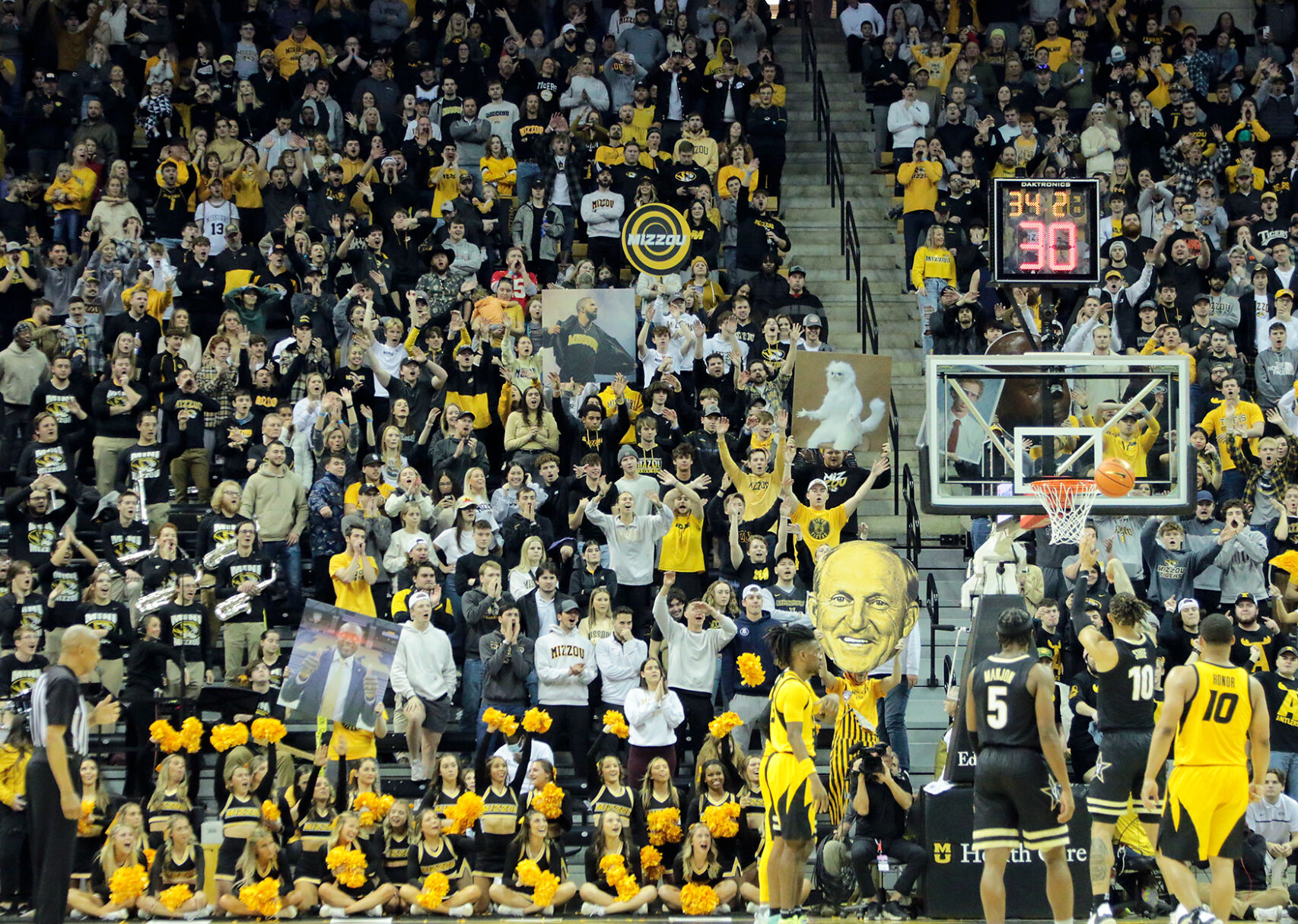 Fans in the Missouri student section attempt
